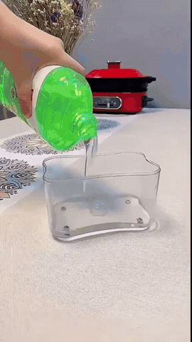 Dispenser de jabón con porta esponja en uso